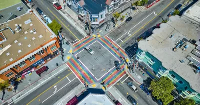 Aerial view of rainbow painted four-way crosswalk in the Castro district, San Francisco, California.