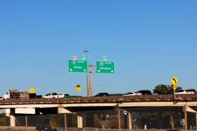 Traffic on Interstate 45 with signs leading to Dallas and Galveston.