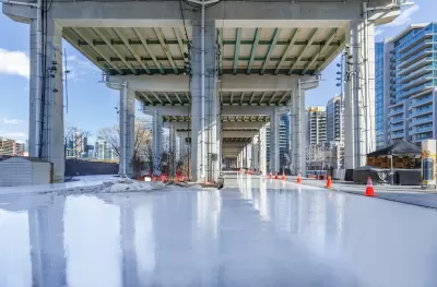 Skating rink under freeway in Bentway park in Toronto, Canada.