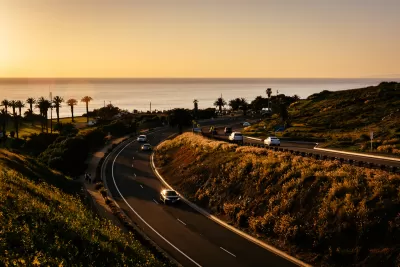 View of Palos Verdes Drive along Pacific Ocean in Palos Verdes, California at sunset.