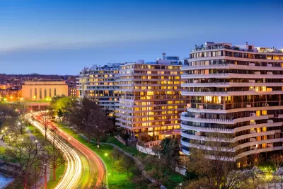 View of multistory apartment buildings in Washington, D.C. at dusk.