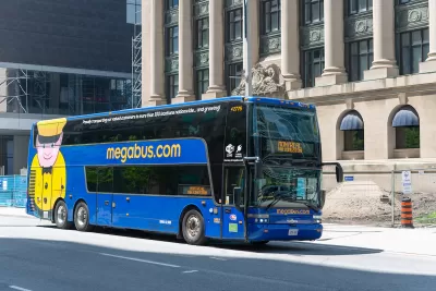 Blue Begabus bus on street in Toronto, Canada.