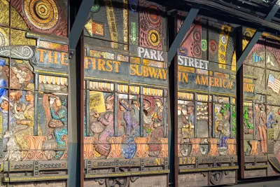 Relief panel in Boston subway station depicting "America's first subway."