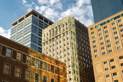 Looking up at office buildings from various eras in downtown Minneapolis, Minnesota.