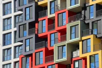 Colorful blocky apartment building facade.