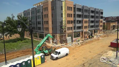 New five-story apartment building under construction.