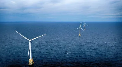 Three offshore windmills off the coast of Rhode Island.