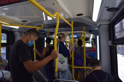 Bus riders wearing masks on a New York City bus 