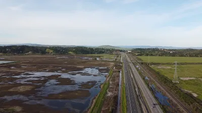 Highway passing through wetlands in Northern California.