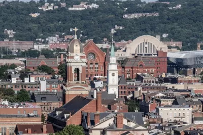 A view over the tops of the historic brick buildings of Cincinnati.