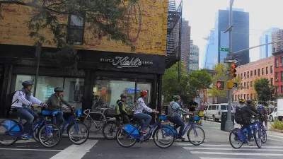 Group of people riding Citibikes in New York City.