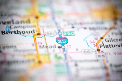 A map of Colorado freeways ad highways and towns, focusing on Interstate 25 in Northern Colorado.