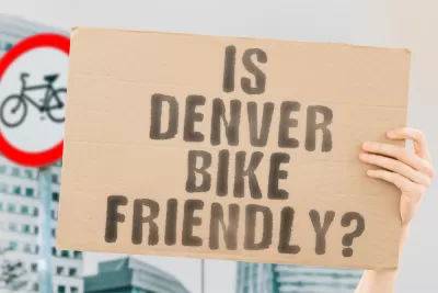 A sign reading "Is Denver Bike Friendly?" is pictured with no background.