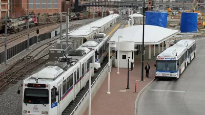 A bus next to the re-located light rail station at Denver's Union Station