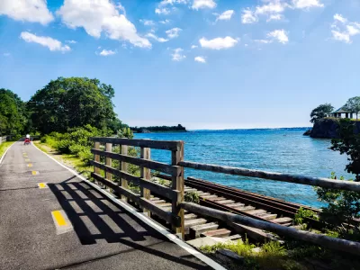 The East Bay Bike Lane runs along the water in Rhode Island.