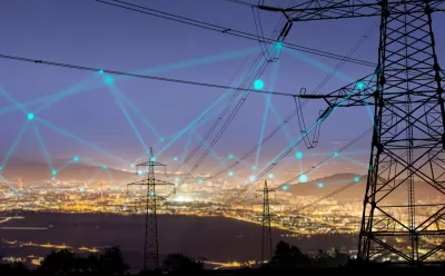 A grid of connected energy, shown as an imagined web over the night sky of an unnamed city.