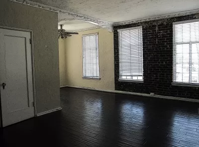 Empty living room/dining room in an apartment in a 1920s apartment house, Los Angeles, California.