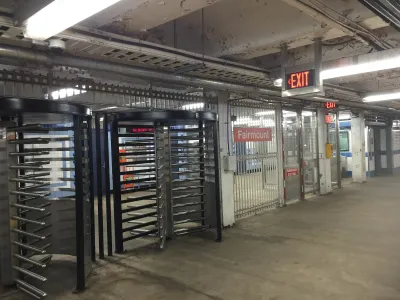 Floor-to-ceiling rotating gates at Fairmount subway station in Philadelphia, Pennsylvania.