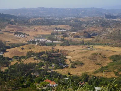 Aerial of Harmony Grove semi-rural community in rolling hills in San Diego County, California.