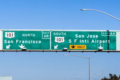 A highway sign reads with directions to reach San Francisco to the north and San Jose to the south--both on Highway 101.