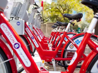Close-up of red Houston BCycle bike share bikes parked at a station