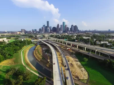A view of Houston's freeways, with downtown in the background.
