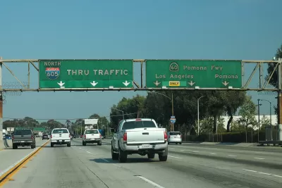 Interstate 605 in Los Angeles with green freeway signs and light traffic