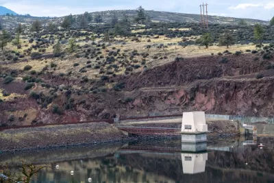 A small dam located in a rural location.