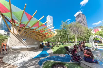 A children's play area is busy with kids and their parents in Downtown Dallas.