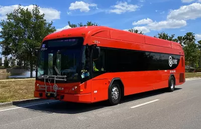 Red Lynx bus in operation on Vineland Avenue in Orlando, Florida in April 2021.