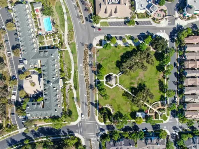 A aerial view of Ladera Ranch, California, showing a variety of buildings and open space.