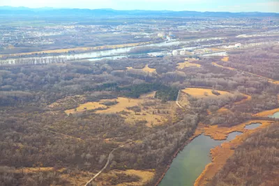 A aerial view of the Lobau floodplain, located to the north of Vienna, Austria and across the Danube River. Vienna is in the background.