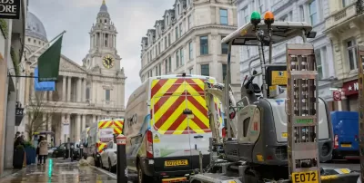 Electric road digger on street construction site in London, UK.
