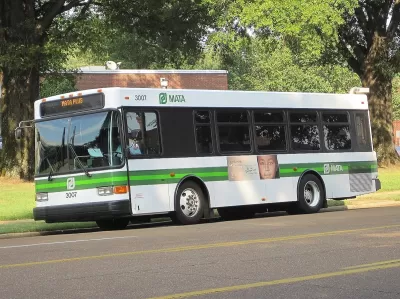 White Memphis Area Transit Authority bus on street in Memphis, Tennessee.