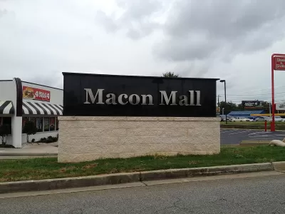 Macon Mall sign outside of low-rise building in Macon, Georgia.