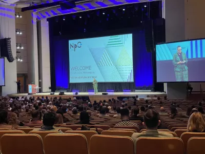 View of the stage, crowd, and speaker at the opening session of NPC24.