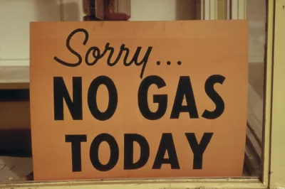 A sign reads “Sorry No Gas Today”.