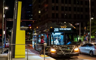 Rapid bus at station at night in Oklahoma City, Oklahoma.