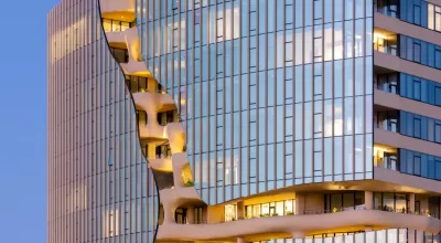 'Vertical canyon' on glass-clad residential high-rise in Denver, CO.