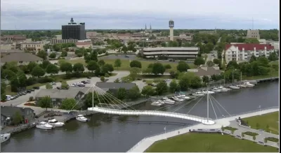 A conceptual rendering of a cable-stayed bicycle and pedestrian bridge over the Sheboygan River in Sheboygan, Wisconsin