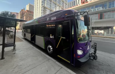 Black and purple hybrid Phoenix Public Transit bus.