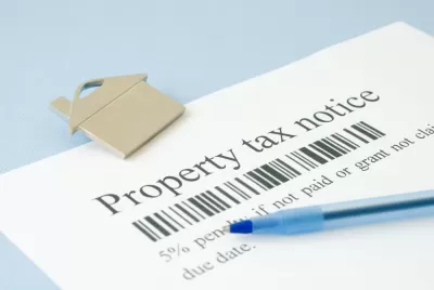 Property tax bill notice with pen