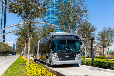 Silver Houston Metro bus on dedicated lane.