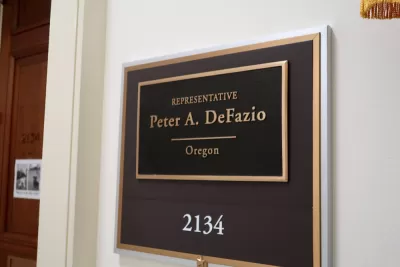 A plaque displaying the name of Re. Peter A. DeFazio, senate representative for the state of Oregon.