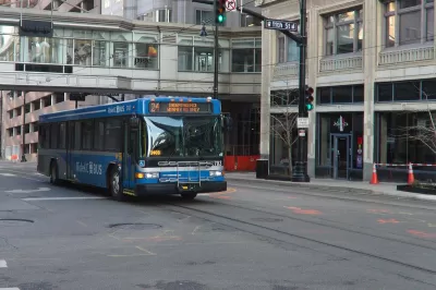 Blue Kansas City transit bus on Main Street, Kansas City, Missouri.