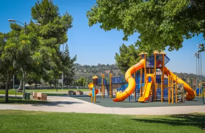 Playground with yellow slides in Rimgrove Park, Los Angeles County