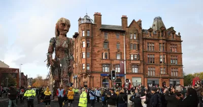 A giant puppet of a sea goddess made entirely of recycled materials walked through Glasgow during the COP26 climate change summit. 