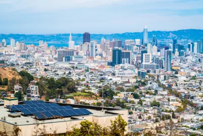 A sunny day in San Francisco, with a view of the city skyline with the Easy Bay Hills in the background.