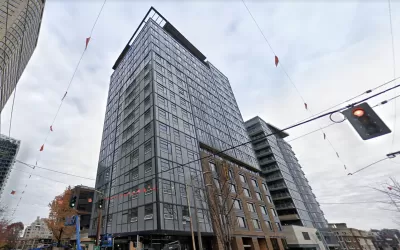Google Street View looking up at The Rise on Madison high-rise apartment building under construction in Seattle, Washington.