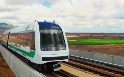 Rendering of white Honolulu light railtrain speeding past landscape